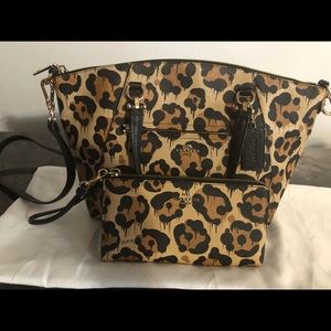 Barely used Leopard Coach Satchel and wallet.